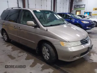2004 Honda Odyssey EX-L z VIN 5FNRL18984B074653, wystawiony jako IAAI lot #41019256 z przebiegiem 247 999 mil mil oraz . Historia ofert i sprzedaży dostępna na DreamBid. Obrazek 1.