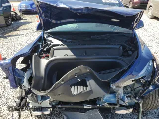 2022 Tesla Model Y Performance z VIN 7SAYGDEF2NF461103, wystawiony jako Copart lot #52198205 z przebiegiem 33 576 mil mil oraz Szkoda całkowita • Salvage title. Historia ofert i sprzedaży dostępna na DreamBid. Obrazek 12.