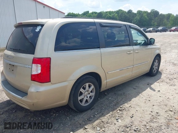 2011 Chrysler Town & Country Touring with VIN 2A4RR5DGXBR613179, listed as a IAAI auction lot 42143355 with 180,906 mi miles and . Bid and sale history available at DreamBid. Image 4.