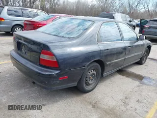 1995 Honda Accord LX with VIN JHMCD5631SC011203, listed as a IAAI auction lot 41891231 with 198,682 mi miles and . Bid and sale history available at carsss.com. Image 4.