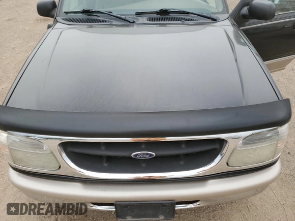 1998 Ford Explorer XL z VIN 1FMZU34E9WZB29566, wystawiony jako Copart lot #58847655 z przebiegiem 144 480 mil mil oraz Szkoda całkowita • Salvage title. Historia ofert i sprzedaży dostępna na DreamBid. Obrazek 11.
