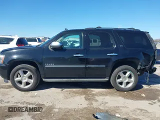 2013 Chevrolet Tahoe LTZ with VIN 1GNSKCE0XDR350970, listed as a IAAI auction lot 41704253 with 126,653 mi miles and . Bid and sale history available at DreamBid. Image 15.