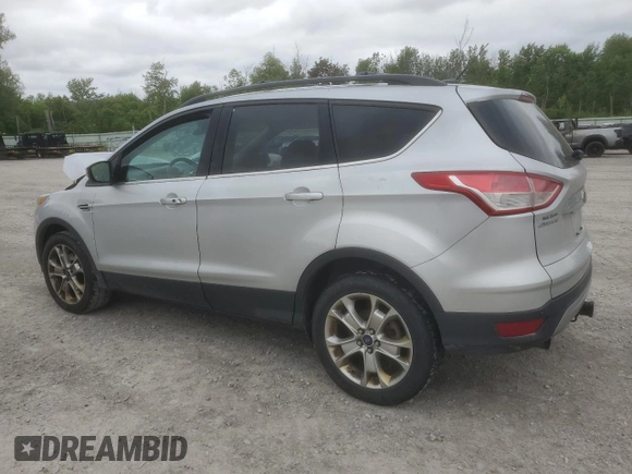 2013 Ford Escape SEL z VIN 1FMCU9H9XDUD00146, wystawiony jako Copart lot #60886165 z przebiegiem 198 557 mil mil oraz Szkoda całkowita • Salvage title. Historia ofert i sprzedaży dostępna na DreamBid. Obrazek 2.