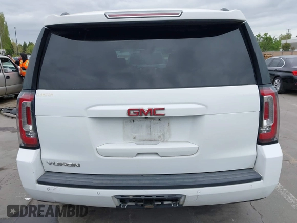2019 GMC Yukon SLT with VIN 1GKS2BKC3KR160060, listed as a IAAI auction lot 42042122 with 124,733 mi miles. Bid and sale history available at carsss.com. Image 17.