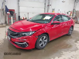 2020 Honda Civic LX with VIN 2HGFC2F6XLH551000, listed as a IAAI auction lot 42279270 with 76,134 mi miles and . Bid and sale history available at DreamBid. Image 2.