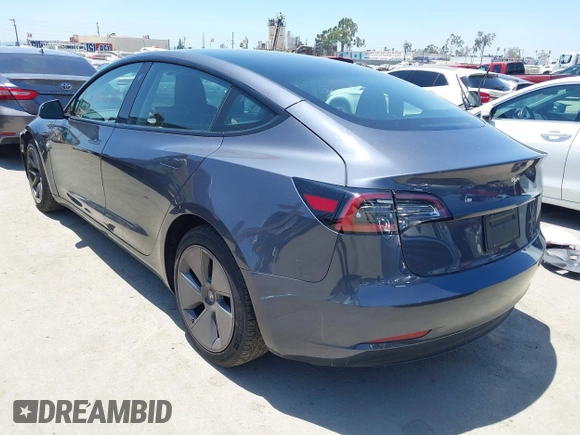 2023 Tesla Model 3 with VIN 5YJ3E1EA1PF545402, listed as a IAAI auction lot 42671354 with 37,948 mi miles and . Bid and sale history available at DreamBid. Image 3.