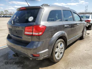2014 Dodge Journey Limited with VIN 3C4PDDDG4ET202173, listed as a Copart auction lot 52020835 with 124,624 mi miles and Salvage Title. Bid and sale history available at carsss.com. Image 3.