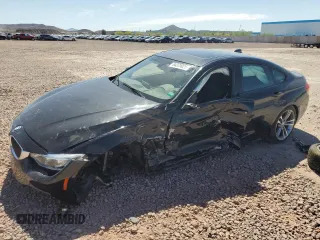 2015 BMW 4 Series 428i xDrive with VIN WBA4C9C56FD331250, listed as a Copart auction lot 54379025 with 42,771 mi miles and Salvage title. Bid and sale history available at DreamBid. Image 1.
