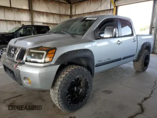 2006 Nissan Titan LE with VIN 1N6BA07A16N573521, listed as a Copart auction lot 51449665 with 158,613 mi miles and Clean Title. Bid and sale history available at carsss.com. Image 1.
