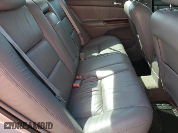 2002 Toyota Camry XLE z VIN 4T1BF32K22U532171, wystawiony jako Copart lot #54527965 z przebiegiem 165 637 mil mil oraz Szkoda całkowita • Salvage title. Historia ofert i sprzedaży dostępna na DreamBid. Obrazek 10.