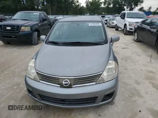 2009 Nissan Versa SL с VIN 3N1BC13E99L470561, выставлен на аукционе Copart как лот 61856455 с пробегом 116 334 миль миль и Чистый • Clean title. История ставок и продаж доступна на DreamBid. Изображение 5.