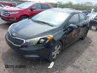 2015 Kia Forte LX with VIN KNAFX4A68F5392766, listed as a IAAI auction lot 41942314 with 229,927 mi miles. Bid and sale history available at carsss.com. Image 2.