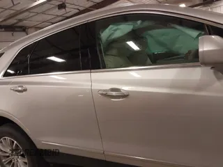 2017 Cadillac XT5 Premium Luxury AWD with VIN 1GYKNERS1HZ282954, listed as a IAAI auction lot 41217097 with 63,154 mi miles. Bid and sale history available at carsss.com. Image 14.
