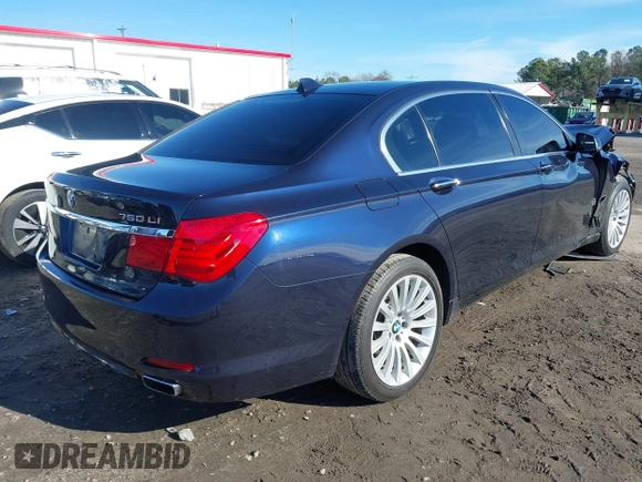 2012 BMW 7 Series 750Li xDrive with VIN WBAKC8C52CC436399, listed as a IAAI auction lot 41214440 with 122,532 mi miles and . Bid and sale history available at DreamBid. Image 4.