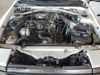 1986 Toyota Celica z VIN JT2ST64CXG7013064, wystawiony jako Copart lot #44228575 z przebiegiem 101 881 mil mil oraz Szkoda całkowita • Salvage title. Historia ofert i sprzedaży dostępna na DreamBid. Obrazek 11.