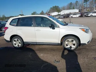 2016 Subaru Forester 2.5i with VIN JF2SJAAC9GG419620, listed as a IAAI auction lot 41751853 with 128,698 mi miles and . Bid and sale history available at DreamBid. Image 13.