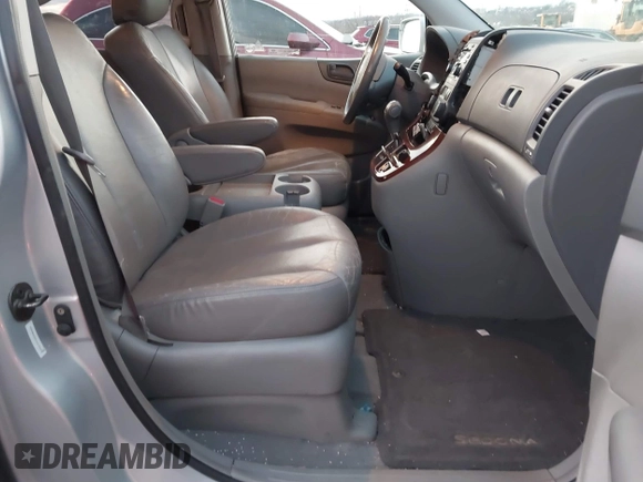 2007 Kia Sedona LX with VIN KNDMB233976172127, listed as a IAAI auction lot 41557356 with 164,383 mi miles. Bid and sale history available at carsss.com. Image 5.