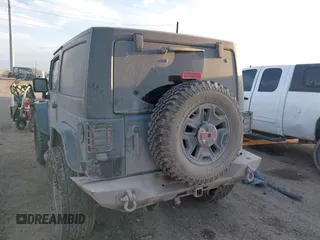 2014 Jeep Wrangler Sport with VIN 1C4AJWAG0EL326774, listed as a IAAI auction lot 41691784 with 98,696 mi miles and . Bid and sale history available at DreamBid. Image 3.