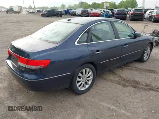2007 Hyundai Azera SE with VIN KMHFC46F47A195122, listed as a IAAI auction lot 42202807 with 70,694 mi miles and . Bid and sale history available at DreamBid. Image 4.