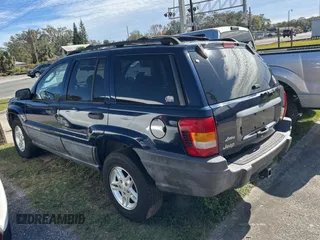 2004 Jeep Grand Cherokee Laredo z VIN 1J4GX48N24C436753, wystawiony jako Copart lot #88142905 z przebiegiem 114 022 mil mil oraz Czysty tytuł • Clean title. Historia ofert i sprzedaży dostępna na DreamBid. Obrazek 3.