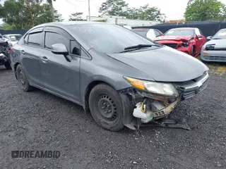 2012 Honda Civic LX z VIN 2HGFB2F55CH322220, wystawiony jako IAAI lot #41702440 z przebiegiem 144 027 mil mil oraz . Historia ofert i sprzedaży dostępna na DreamBid. Obrazek 1.