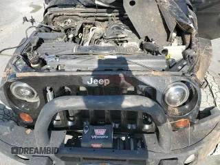 2012 Jeep Wrangler Unlimited Sahara with VIN 1C4BJWEG5CL235835, listed as a Copart auction lot 60673555 with 86,606 mi miles and Salvage title. Bid and sale history available at DreamBid. Image 12.