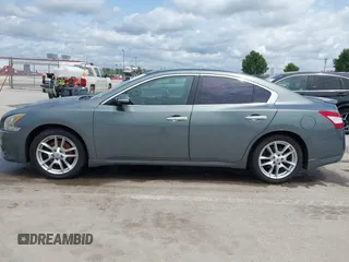 2011 Nissan Maxima S with VIN 1N4AA5AP6BC860597, listed as a IAAI auction lot 42537322 with 125,210 mi miles and . Bid and sale history available at DreamBid. Image 14.