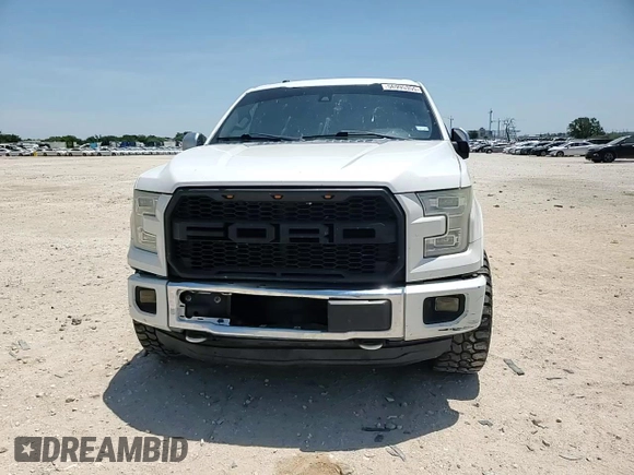 2015 Ford F-150 XLT with VIN 1FTEW1EF7FFA29086, listed as a Copart auction lot 56995355 with 179,859 mi miles and Salvage title. Bid and sale history available at DreamBid. Image 14.