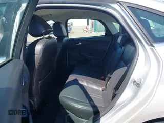 2014 Ford Focus Titanium with VIN 1FADP3J28EL354505, listed as a IAAI auction lot 42025966 with 104,868 mi miles. Bid and sale history available at carsss.com. Image 8.