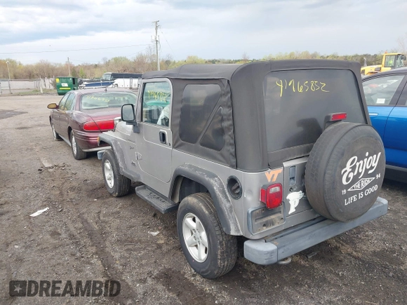 2002 Jeep Wrangler Sport with VIN 1J4FA49SX2P706691, listed as a IAAI auction lot 41965852 with 179,553 mi miles. Bid and sale history available at carsss.com. Image 3.
