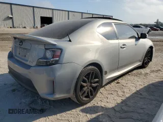 2014 Scion tC with VIN JTKJF5C7XE3068331, listed as a Copart auction lot 44684715 with 141,621 mi miles and Salvage Title. Bid and sale history available at carsss.com. Image 3.