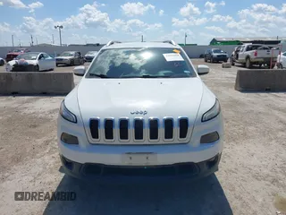 2016 Jeep Cherokee Latitude z VIN 1C4PJMCB9GW305259, wystawiony jako IAAI lot #42093050 z przebiegiem 228 747 mil mil oraz . Historia ofert i sprzedaży dostępna na DreamBid. Obrazek 12.