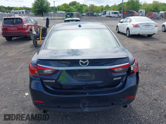2015 Mazda 6 i Grand Touring with VIN JM1GJ1W53F1200121, listed as a IAAI auction lot 42173036 with 76,184 mi miles and . Bid and sale history available at DreamBid. Image 16.
