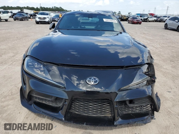 2021 Toyota GR Supra 3.0 with VIN WZ1DB0C00MW042681, listed as a Copart auction lot 59174324 with 7,718 mi miles and Salvage Title. Bid and sale history available at carsss.com. Image 5.