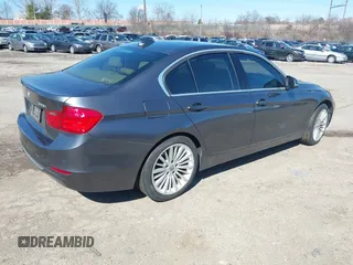 2012 BMW 3 Series 328i with VIN WBA3A5C53CF256338, listed as a IAAI auction lot 41758662 with 99,607 mi miles. Bid and sale history available at carsss.com. Image 4.