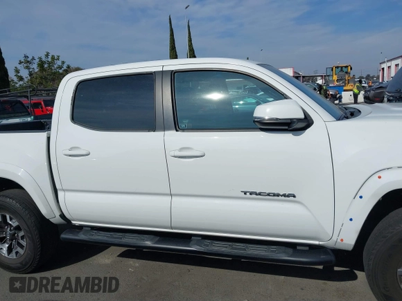 2017 Toyota Tacoma SR5 with VIN 3TMAZ5CN9HM031576, listed as a IAAI auction lot 41457373 with 166,219 mi miles and . Bid and sale history available at DreamBid. Image 14.