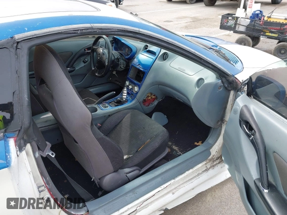 2000 Toyota Celica GTS z VIN JTDDY32T2Y0015579, wystawiony jako IAAI lot #41548735 z przebiegiem Nie podano mil oraz . Historia ofert i sprzedaży dostępna na DreamBid. Obrazek 5.