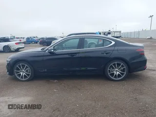 2023 Genesis G70 2.0T z VIN KMTG34TA5PU123377, wystawiony jako IAAI lot #41632566 z przebiegiem 12 184 mil mil oraz . Historia ofert i sprzedaży dostępna na DreamBid. Obrazek 14.