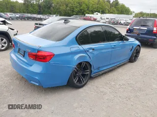 2016 BMW M3 z VIN WBS8M9C57GP966908, wystawiony jako IAAI lot #42318665 z przebiegiem 50 498 mil mil oraz . Historia ofert i sprzedaży dostępna na DreamBid. Obrazek 4.