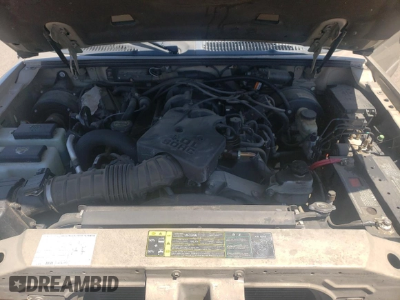 2004 Ford Explorer Sport Trac XLS z VIN 1FMZU67K34UC40112, wystawiony jako Copart lot #57877855 z przebiegiem 139 350 mil mil oraz Szkoda całkowita • Salvage title. Historia ofert i sprzedaży dostępna na DreamBid. Obrazek 11.