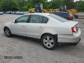 2009 Volkswagen Passat z VIN WVWJK93C49P054575, wystawiony jako Copart lot #57880855 z przebiegiem 148 327 mil mil oraz Szkody całkowita. Historia ofert i sprzedaży dostępna na DreamBid. Obrazek 2.