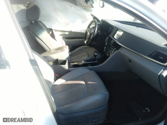 2017 Kia Optima EX with VIN 5XXGU4L32HG156941, listed as a IAAI auction lot 40299001 with 128,592 mi miles. Bid and sale history available at carsss.com. Image 5.