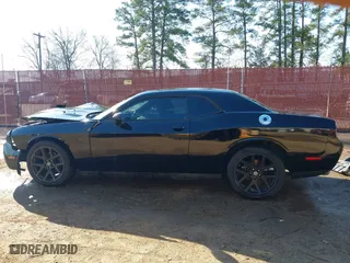 2013 Dodge Challenger SXT with VIN 2C3CDYAG5DH562557, listed as a IAAI auction lot 41694697 with 135,915 mi miles. Bid and sale history available at carsss.com. Image 15.