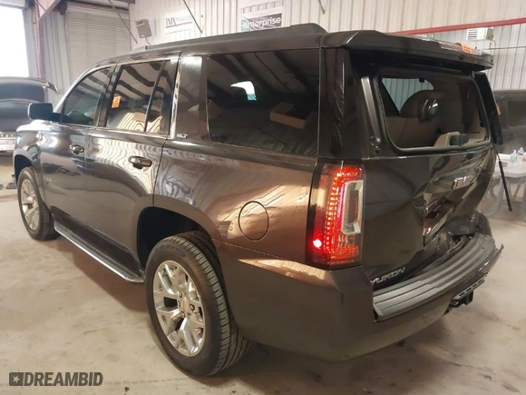 2016 GMC Yukon SLT with VIN 1GKS2BKC8GR277799, listed as a IAAI auction lot 41400549 with 91,139 mi miles. Bid and sale history available at carsss.com. Image 3.