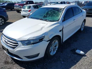 2013 Ford Taurus SEL with VIN 1FAHP2E80DG179961, listed as a IAAI auction lot 42088532 with 131,196 mi miles and . Bid and sale history available at carsss.com. Image 6.