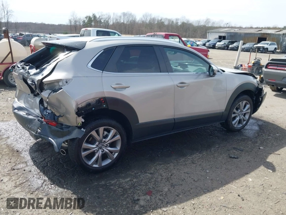 2022 Mazda CX-30 S Select with VIN 3MVDMBBL4NM401563, listed as a IAAI auction lot 41826878 with 4,733 mi miles and . Bid and sale history available at carsss.com. Image 13.