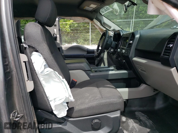 2020 Ford F-150 XL with VIN 1FTEX1CP5LFC31512, listed as a Copart auction lot 65382165 with 131,585 mi miles and Salvage title. Bid and sale history available at DreamBid. Image 7.