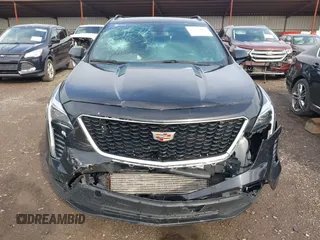 2019 Cadillac XT4 AWD Sport with VIN 1GYFZFR40KF111912, listed as a IAAI auction lot 42375992 with 98,006 mi miles and . Bid and sale history available at DreamBid. Image 12.