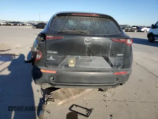 2021 Mazda CX-30 2.5 S with VIN 3MVDMAAL5MM212947, listed as a Copart auction lot 42434105 with 104,878 mi miles and Salvage Title. Bid and sale history available at carsss.com. Image 6.
