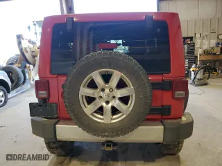 2012 Jeep Wrangler Unlimited Sahara with VIN 1C4BJWEG3CL179457, listed as a Copart auction lot 42768745 with 162,075 mi miles and Salvage Title. Bid and sale history available at carsss.com. Image 6.